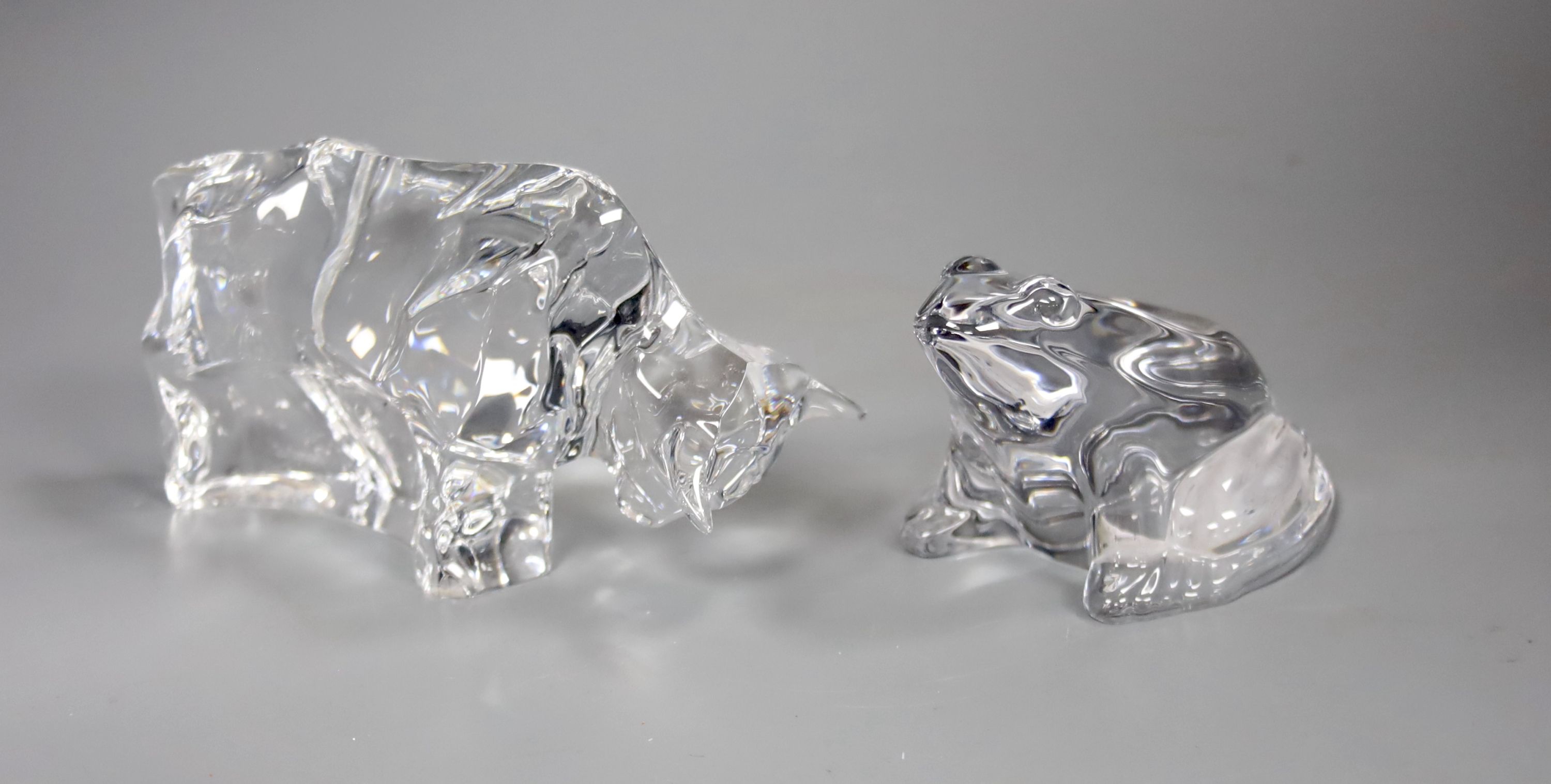 A Baccarat crystal figure of a frog, 7cm high, together with a Baccarat crystal figure of a bull, 15cm long